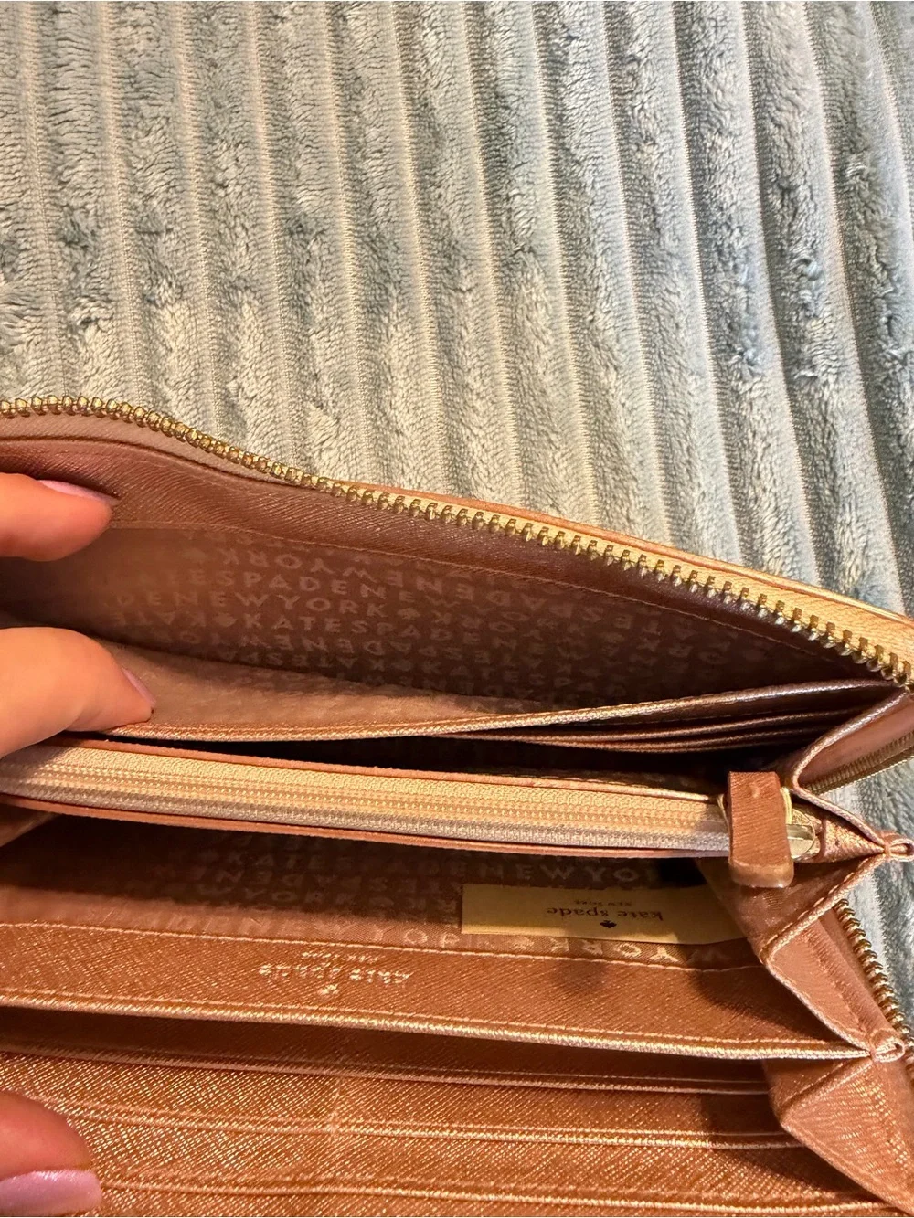 kate spade metallic rose gold zip-around wallet